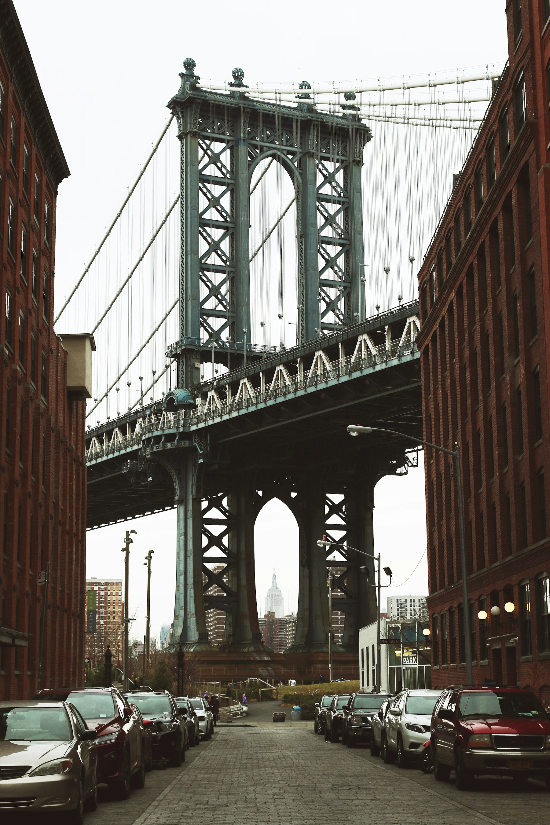 Manhattan Bridge framed by DUMBO streets in Brooklyn